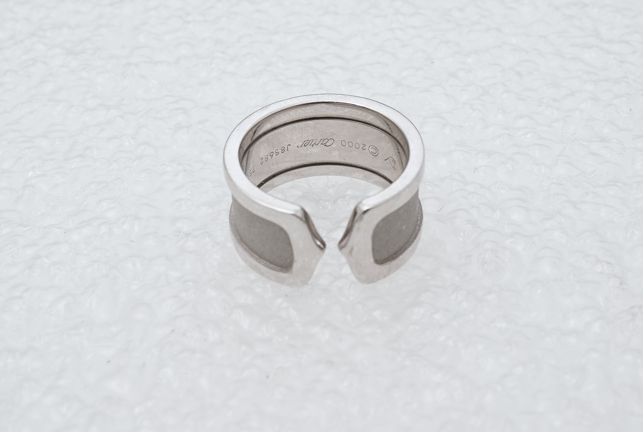Cartier, a white gold ring, 'C de Cartier', circa 2000
